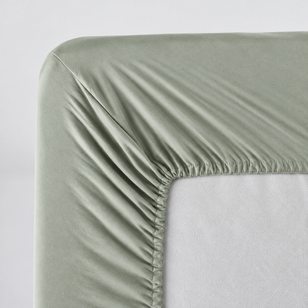 Plumelle Earth Fitted Sheet in Sage, elastic all the way around for a neat fit
