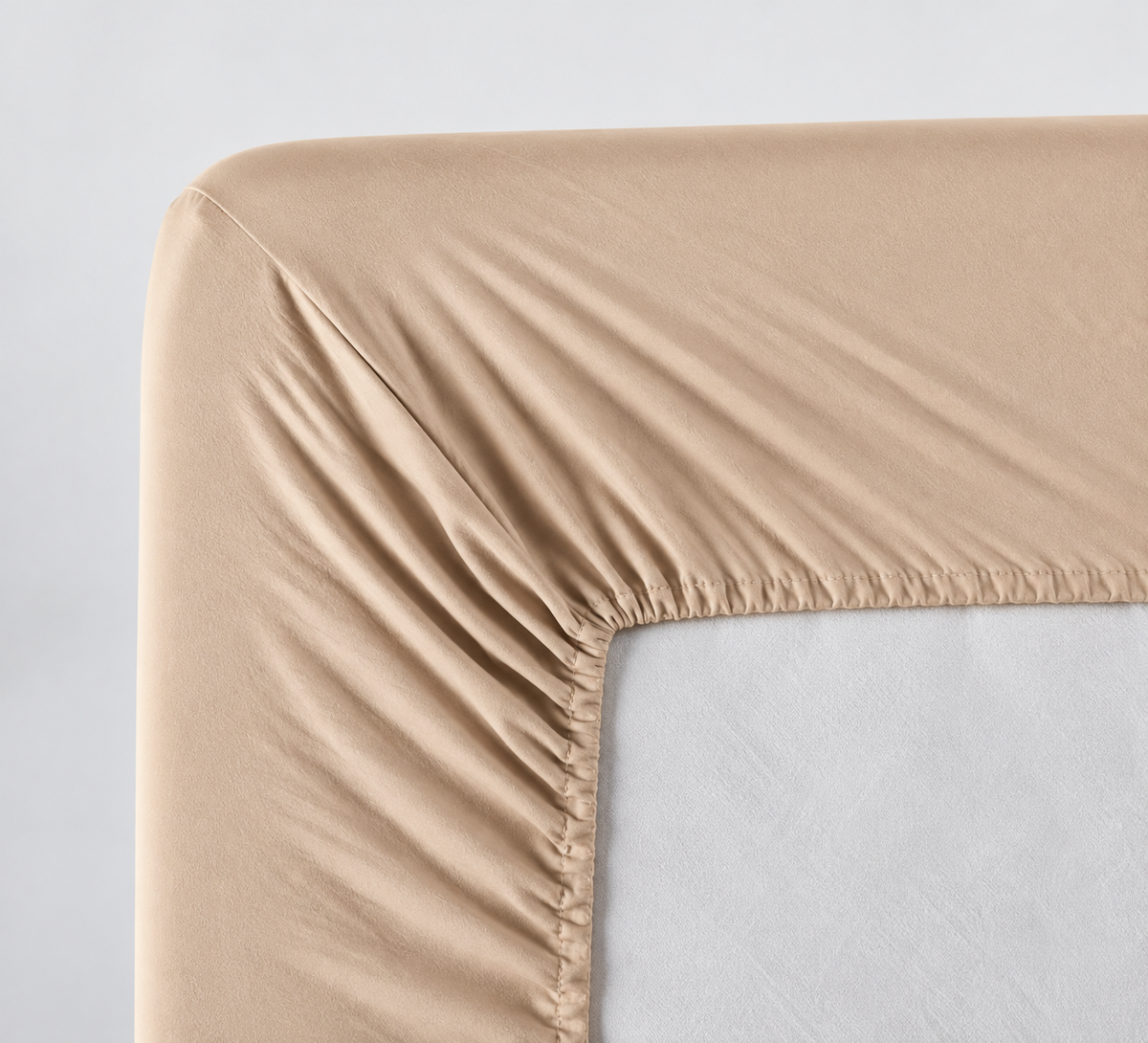 Plumelle Earth Fitted Sheet in Sand, elastic all the way around for a neat fit